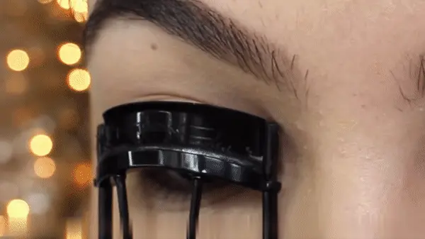 Curl your lashes with eyelash curler if they are not curled naturally